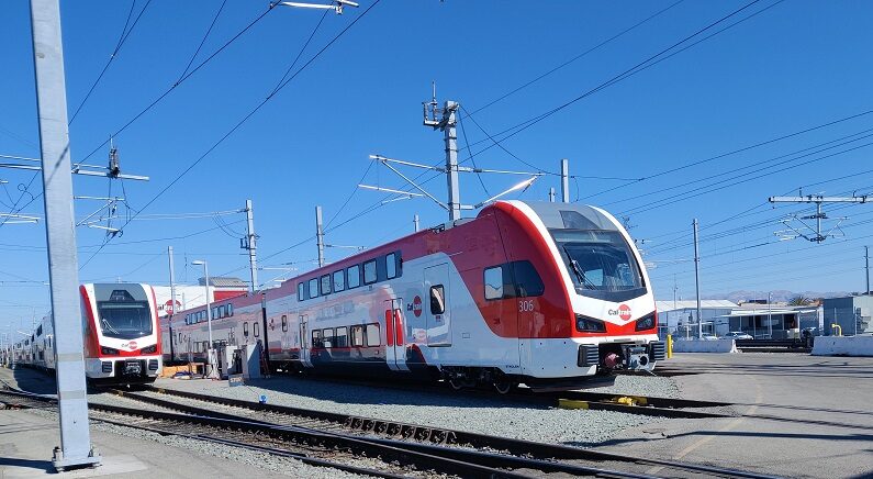 A Caltrain EMU (electric multiple unit) sits in a yard while undergoing testing, October 2023. Service is set to begin late 2024 but was delayed for 3 years due to CEQA lawsuits with dubious environmental basis.